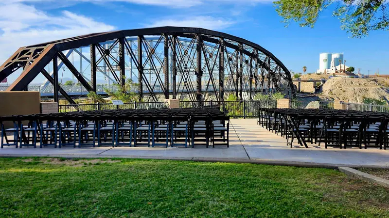Wedding chairs over looking historic bridge at Yuma Territorial Prison in Yuma, Arizona